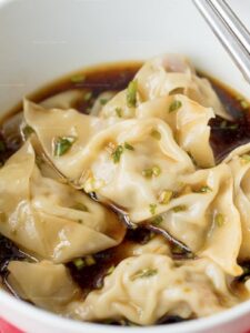 Steamed Pork Dumplings With A Scallion Dipping Sauce Recipe