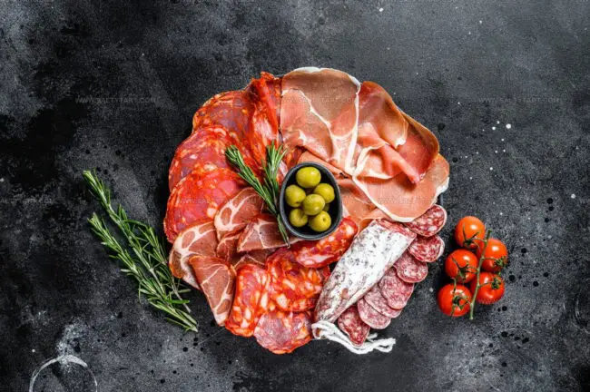 How Are Spanish Cured Meats Traditionally Served?